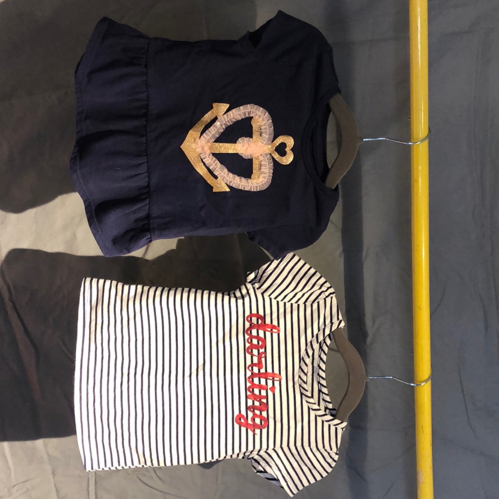 Two girls shirts; come together.